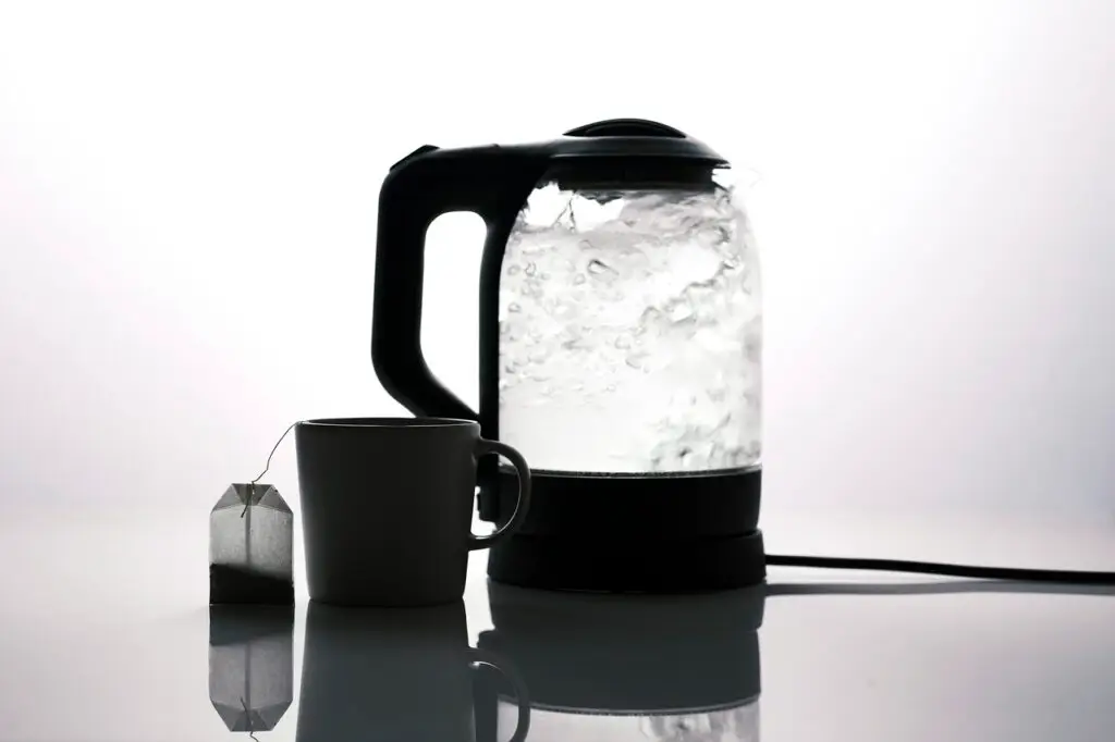 electric kettle, tea, boiling water, tea bag, mug, tea cup, cup, teacup, boil, hot, glass, kitchen, heater, electric kettle, electric kettle, electric kettle, electric kettle, boiling water, boiling water, boiling water, boiling water, boiling water, boil, kitchen, kitchen, kitchen, kitchen