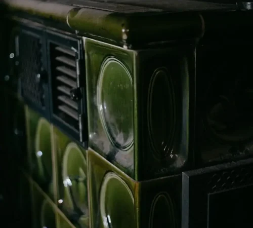 a close up of a green and black cabinet